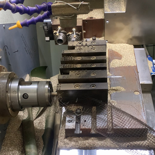 Automatic conveying and milling processing by CNC lathes